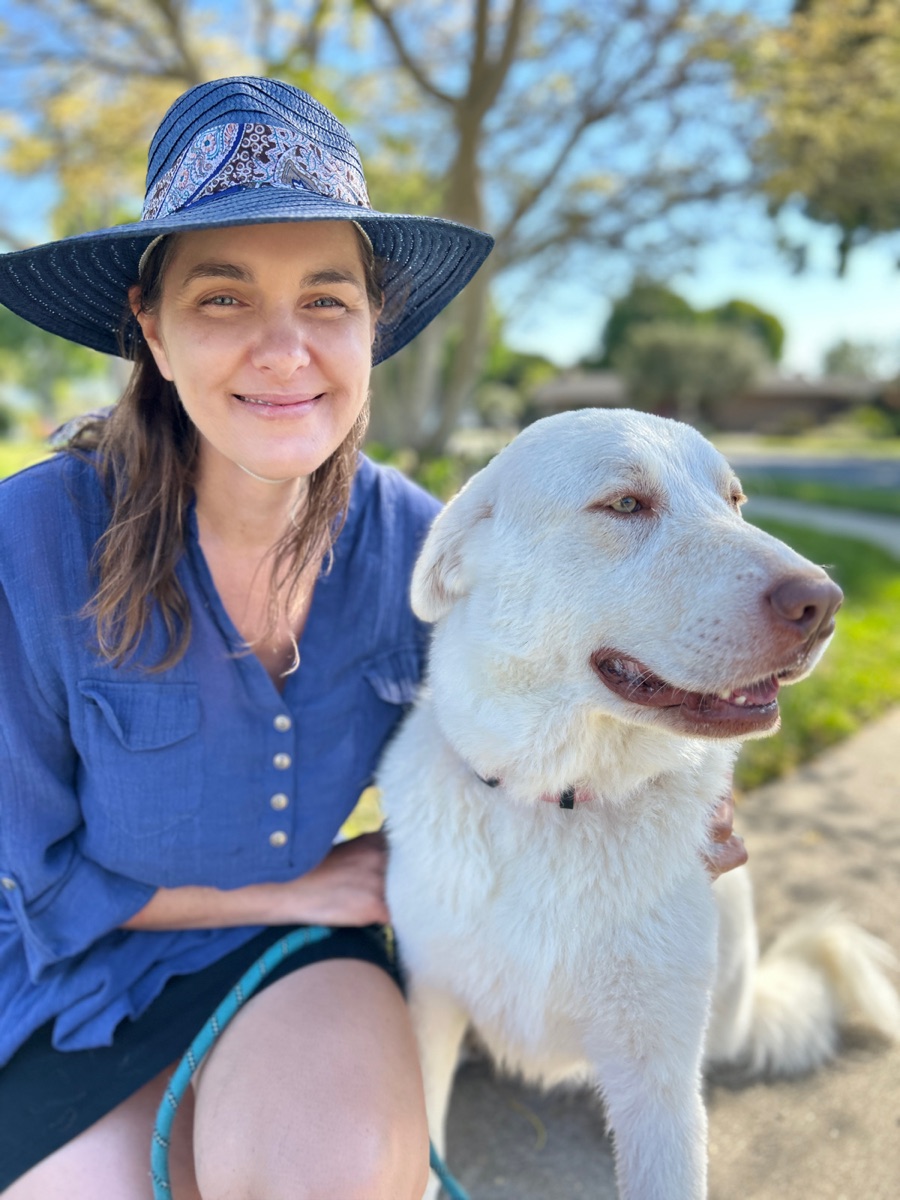 Georgia in a blue hat with Luna